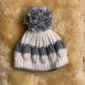 Knitted head warmer with puff on top